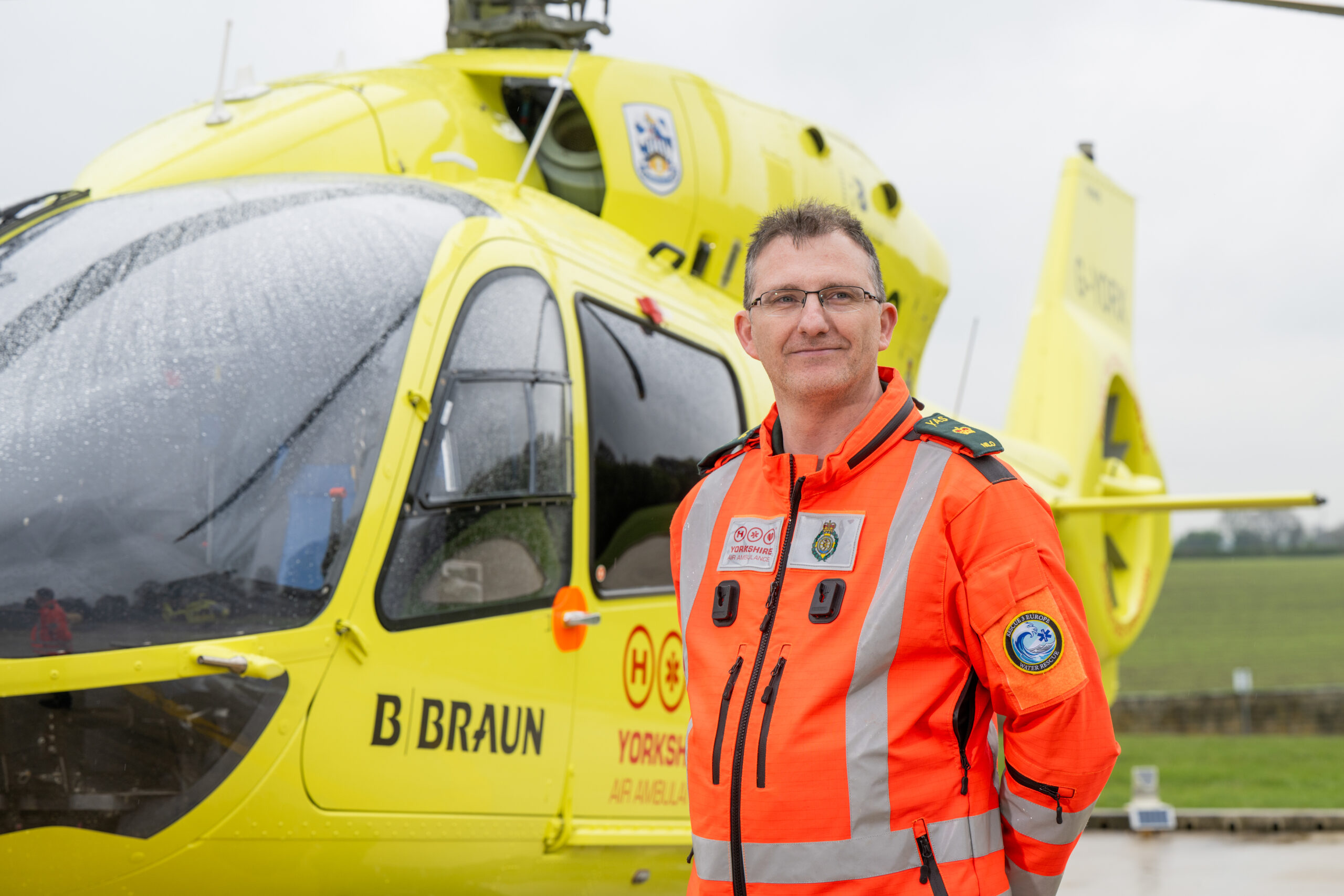 Paramedic next to helicopter