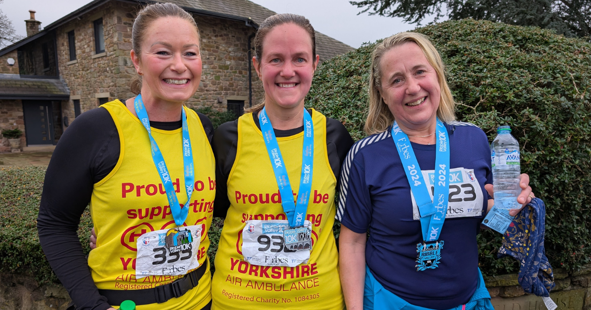 Image shows from left to right Gemma Carson, Laura Laycock and Joanne Spencer with their medals at the end of the Ribble Valley 10K